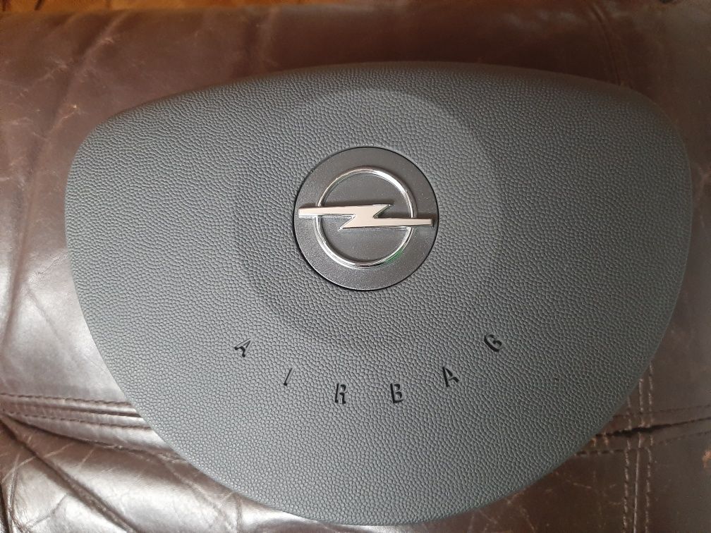 1 Airbag, 2 cover com simbolo da Opel, 1 inflator
