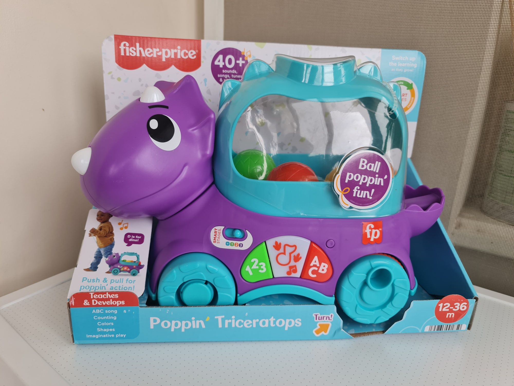 Музична каталка Fisher-Price Smart Stages динозавр Веселий трицератопс