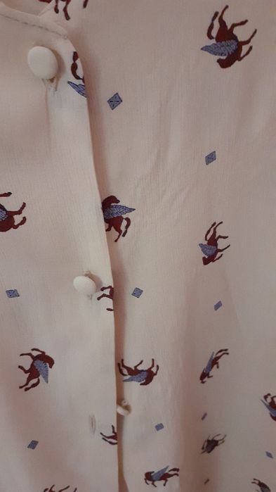 2 € Blusa XL de manga curta, botões forrados, tecido fresco