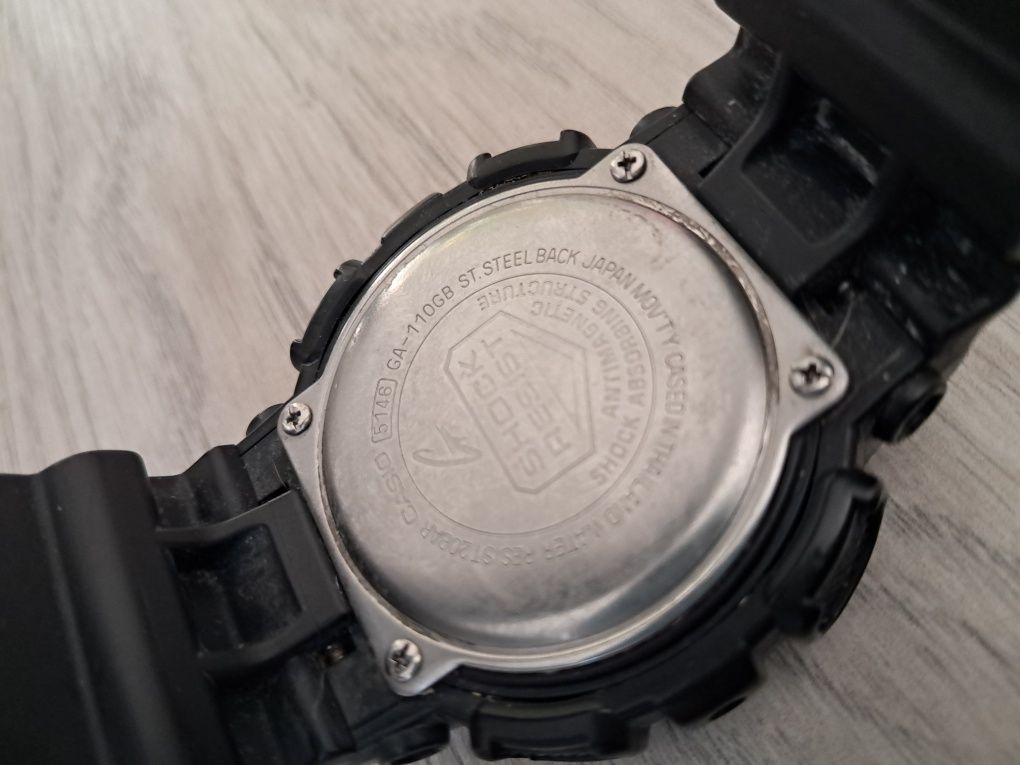 Casio męski zegarek G-Shock 5146 czarno złoty