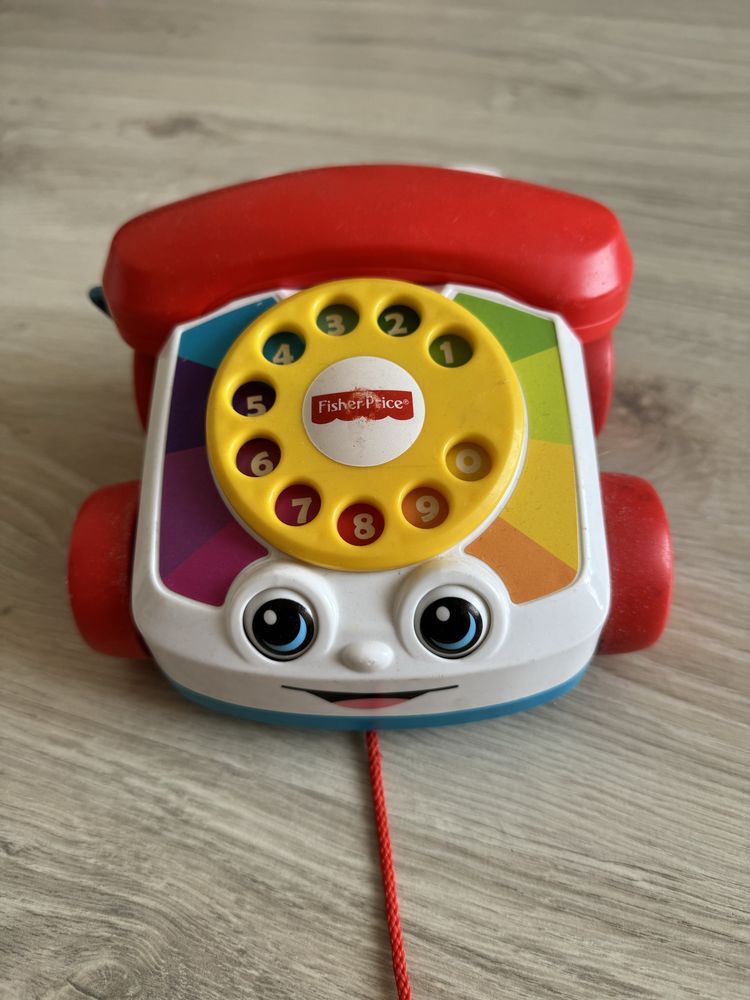 Іграшка - каталка від Fisher-Price