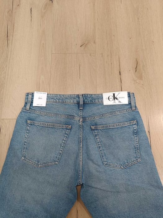 Calvin Klein Slim W34 L32 oryginalne spodnie