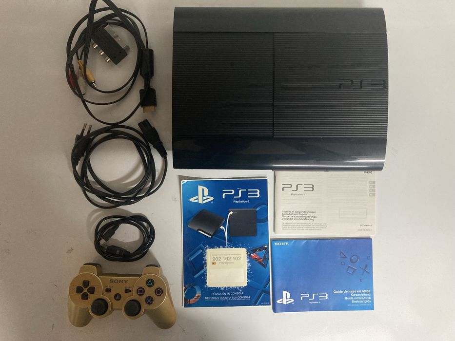 PS3 Super Slim com manuais