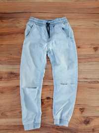 Joggersy 122 Reserved spodnie jeansowe z dziurami chłopięce