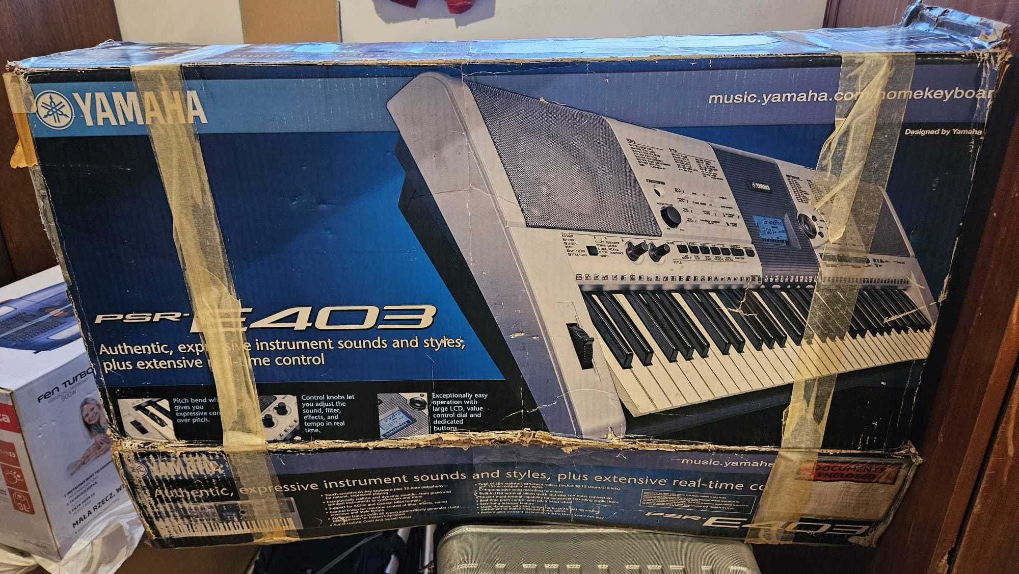 Keyboard Yamaha PSR-E403 wraz z pokrowcem oraz statywem.