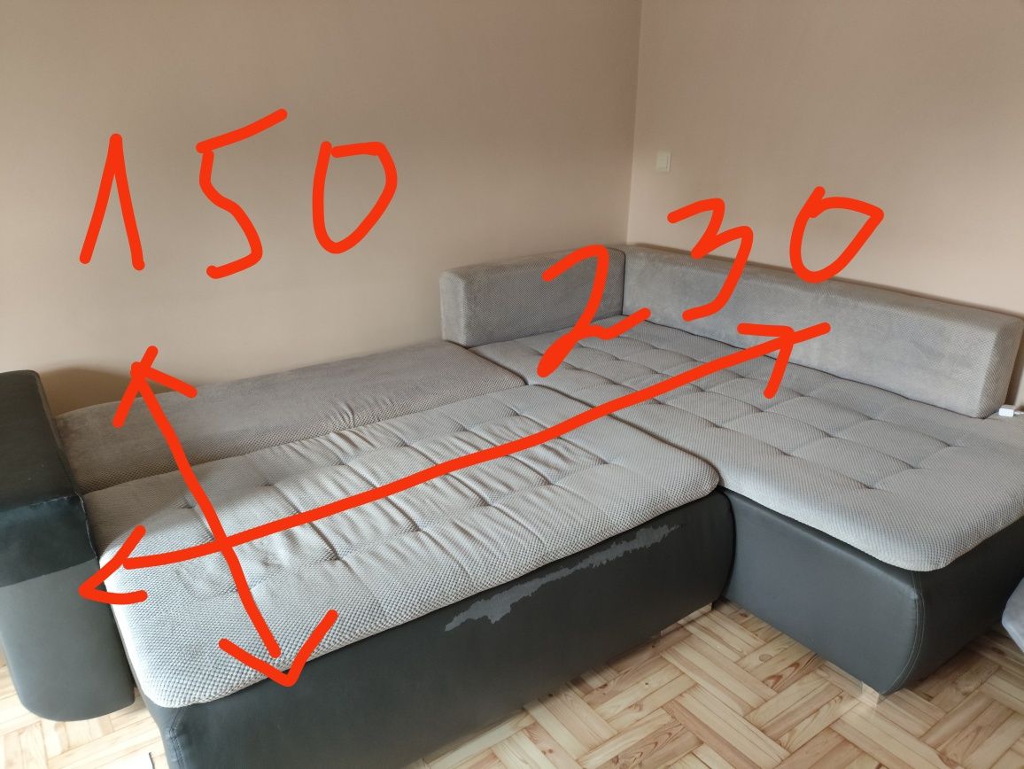 Szary narożnik z funkcją spania