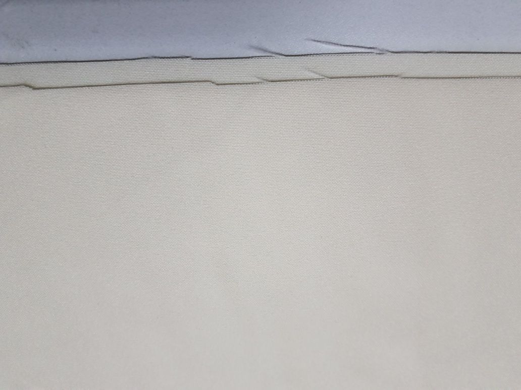 Tkanina kremowa szer.148 cm.