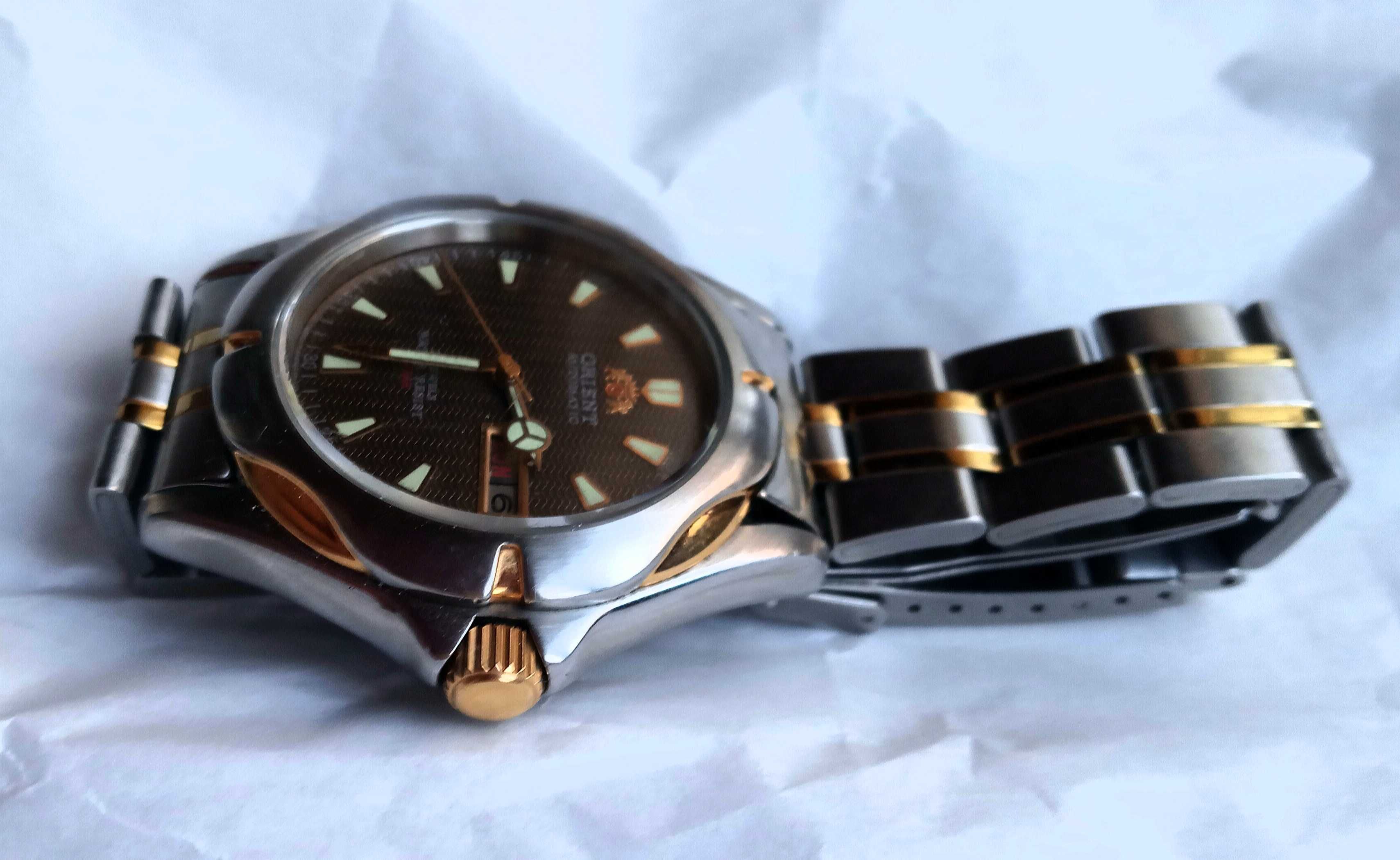 Часы Orient  коричневый гильошированный циферблат