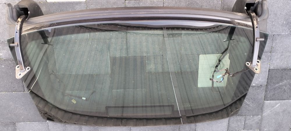 Заднє скло шкода суперб ліфбек 2010рік коричнева