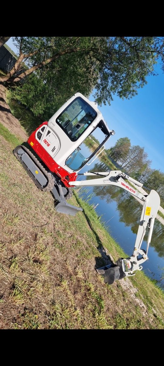 Roboty ziemne [ koparką i ładowarką)