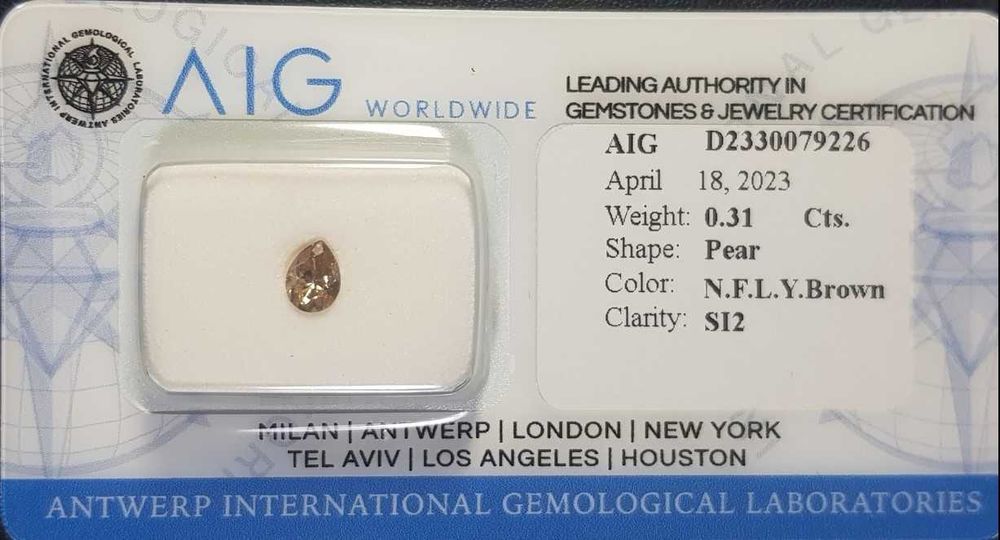 Diamante - 0.31 ct - Pear - fancy light yellow brown - SI2