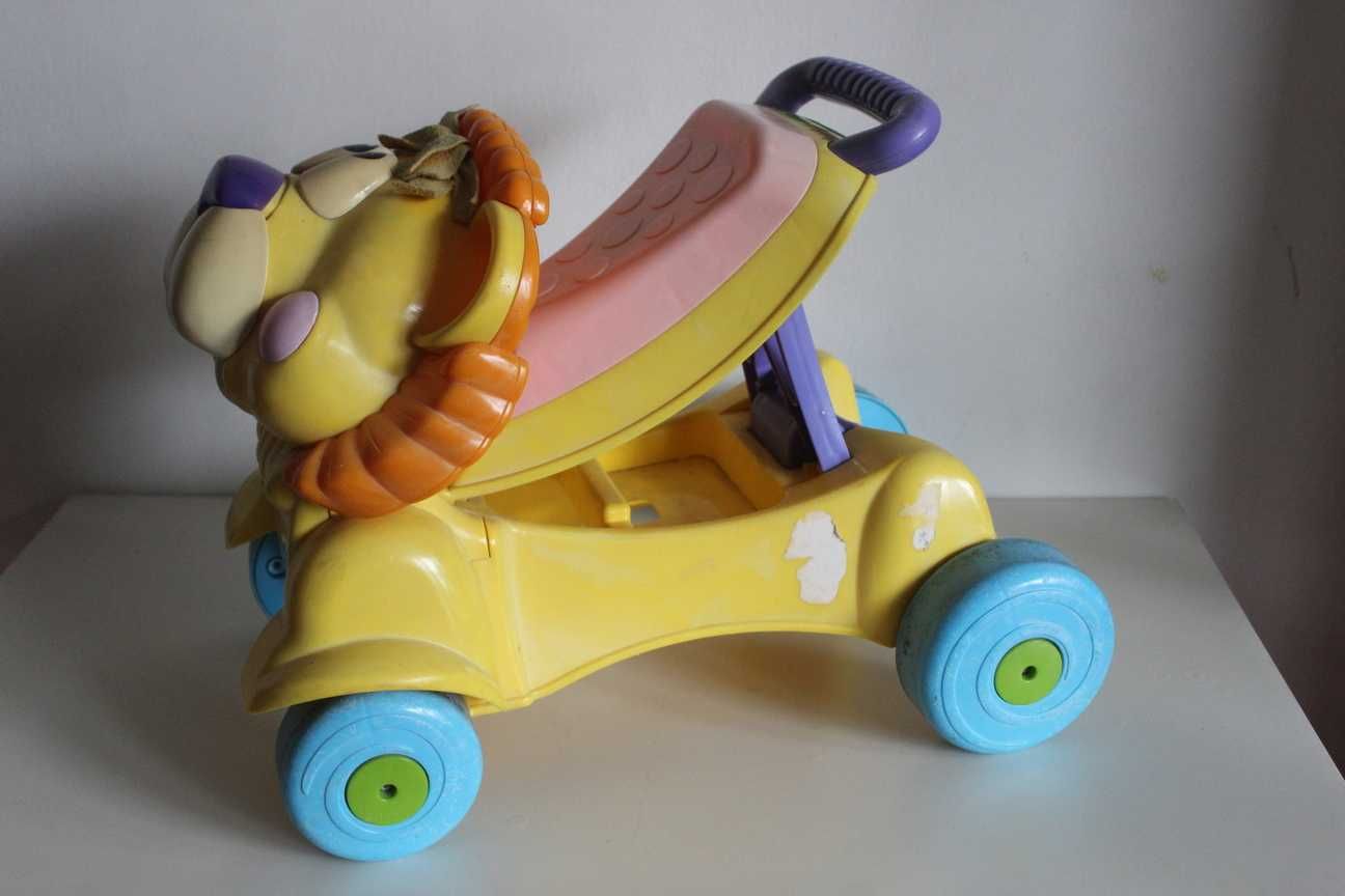 Fisher Price - Pchacz wózek jeździk grający lew