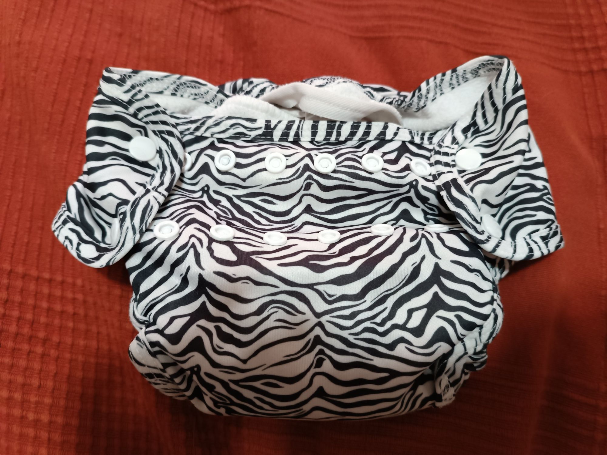 Fralda Bolso - T1 (4-9 kgs) - Total Stripe Out
Total Str