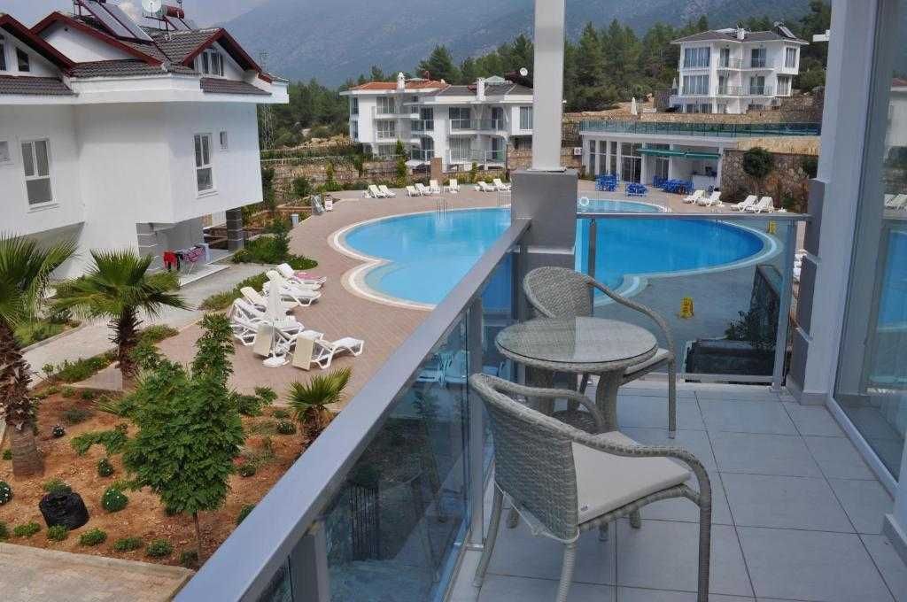 Аренда апартаментов 2+1, 90 м.кв. Личный сад с барбекю.Олюдениз,Турция