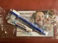 Клей и щетка для зубных протезов
