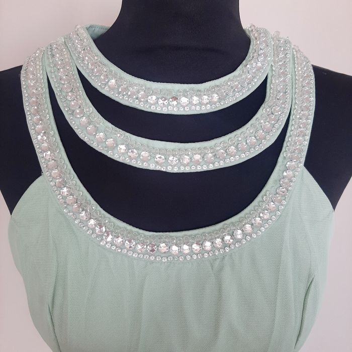 Miętowa Sukienka z tiulową spódnicą odkrytymi plecami np na wesele