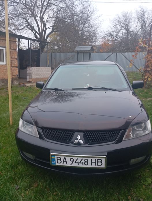 Митсубиси Лансер9