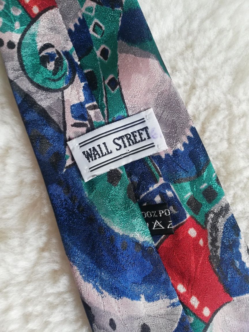 Wielobarwny krawat, bardzo ładnie odszyty, wykończony Wall Street