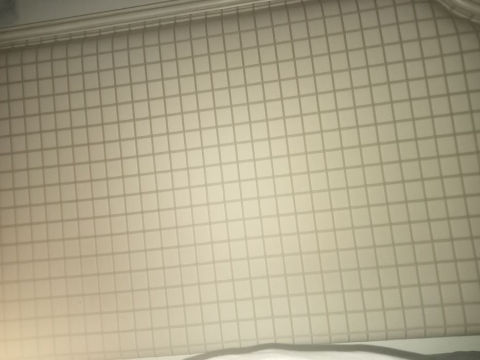 Cabeceira de cama e cortinados