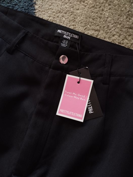 Czarne szerokie spodnie bojówki cargo z kieszeniami plt