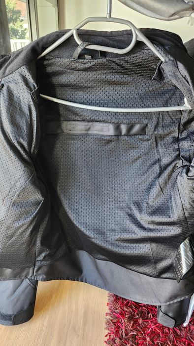 Casaco e capacete de mota novos para mulher