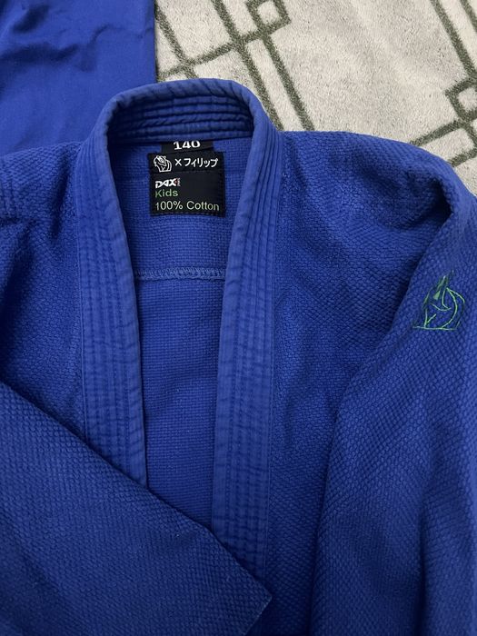 Продам кимоно для дзюдо 140см неAdidas