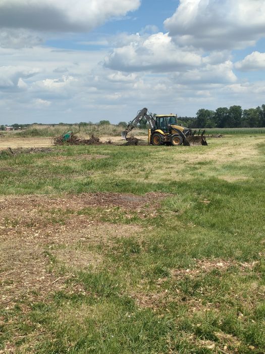 Roboty ziemne koparko-ładowarką minikoparka wyburzenia rozbiórki