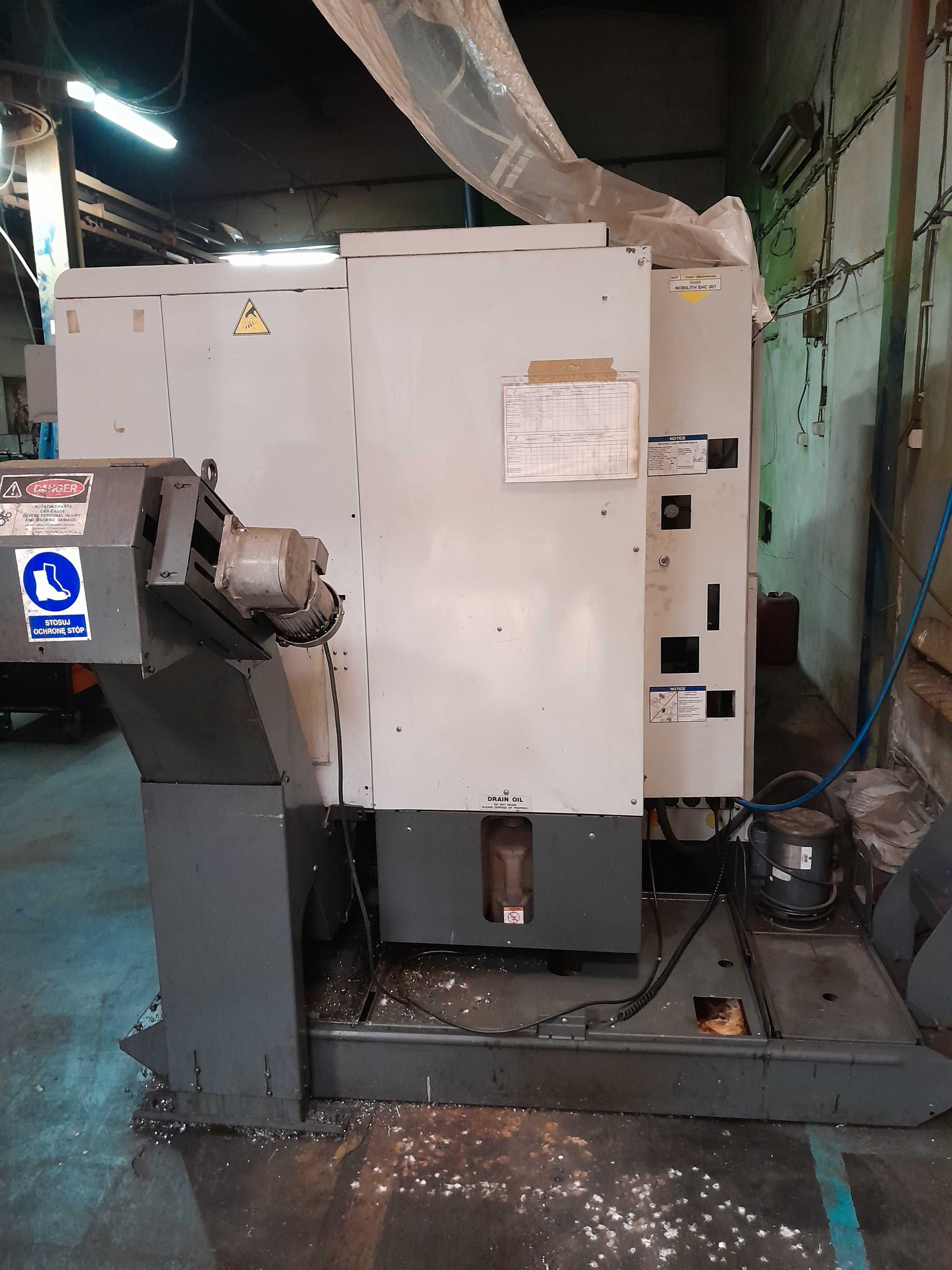 Tokarka CNC HASS ST30 z podajnikiem