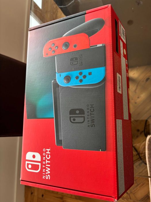 Nintendo Switch com capas para comandos