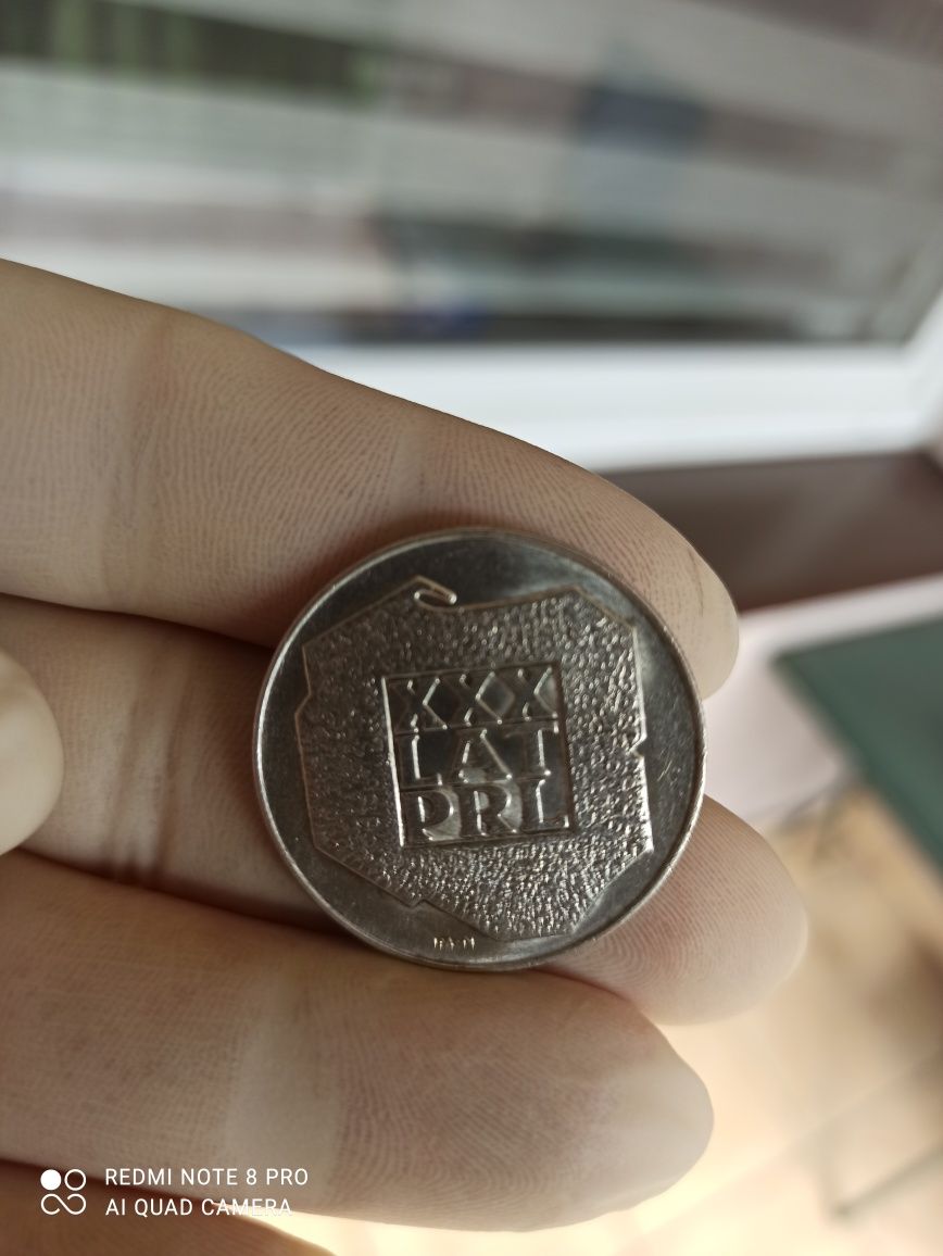 Srebrna moneta 200 złotych oryginał