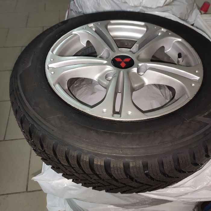 Продам комплект дисков автомобильных R 14, с зимней резиной.