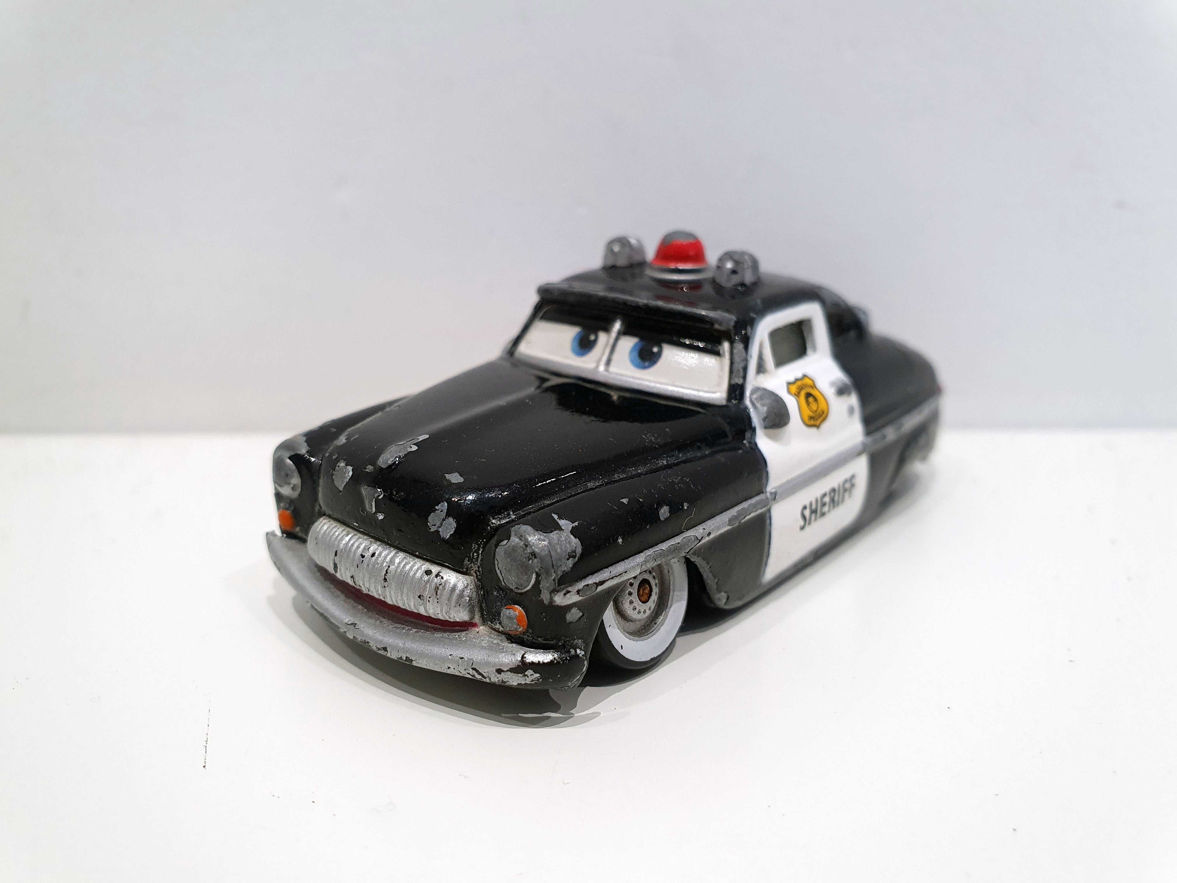 Mattel Disney Pixar Cars Auta Szeryf Sheriff DXV29