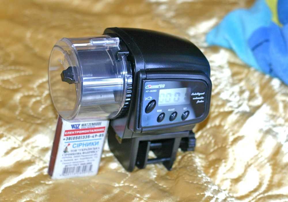 Для рыбок автокормушка в аквариум с таймером RESUN AF-2009D