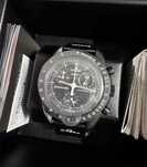 Swatch xOmega Bioceramic Moonswatch Mission To Moonphase Snoopy
Black