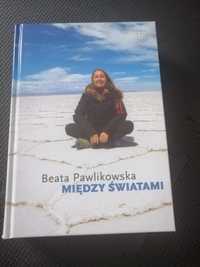 Między światami Beata Pawlikowska