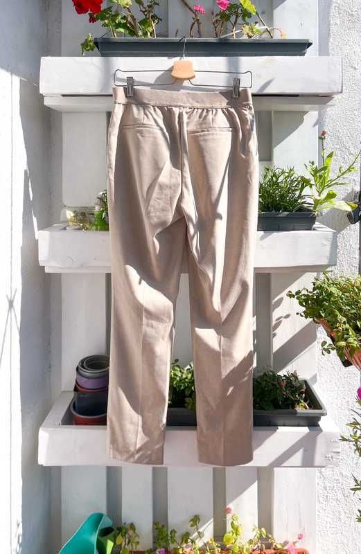 Beżowe eleganckie spodnie cygaretki z prostą nogawką H&M 38