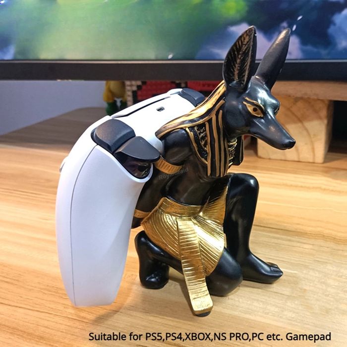 Artefacto para suporte de comando ou telemóvel
