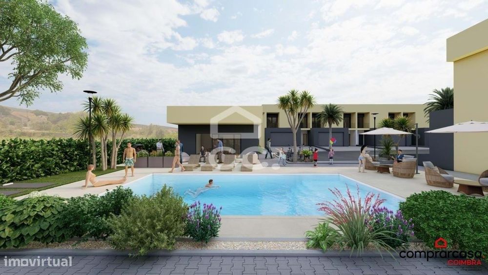 Moradia T4 nova em condomínio fechado com piscina, jardins e campo de