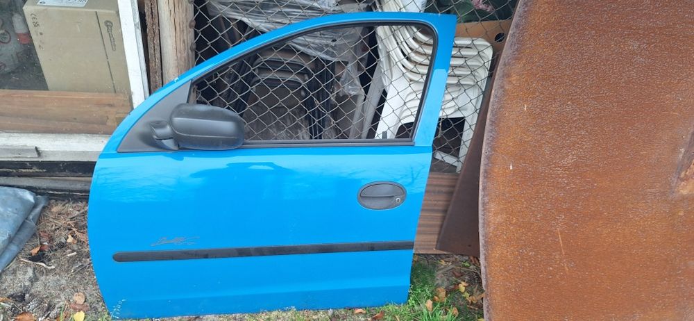 Corsa drzwi lewy przód 5d