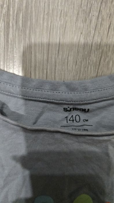 Niebieska Koszulka boy z dinozaurem