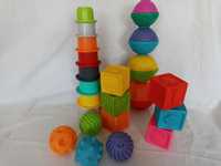 Zabawki sensoryczne piłeczki kostki kubeczki zestaw