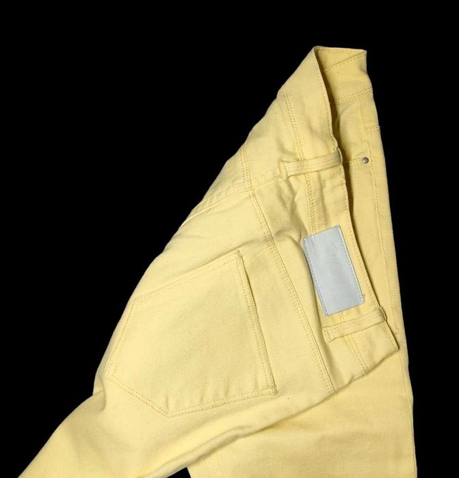Cytrynowe jeansy slim r. 38