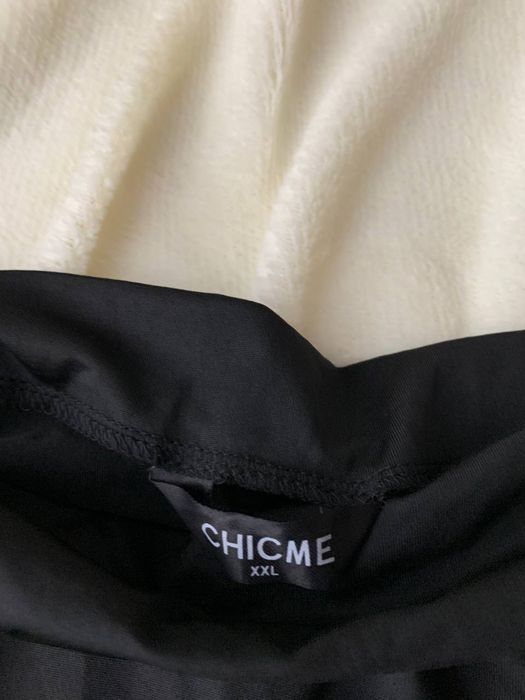 Чорний комбінезон