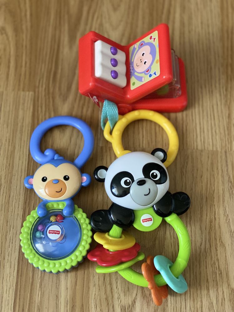 grzechotki fisher price