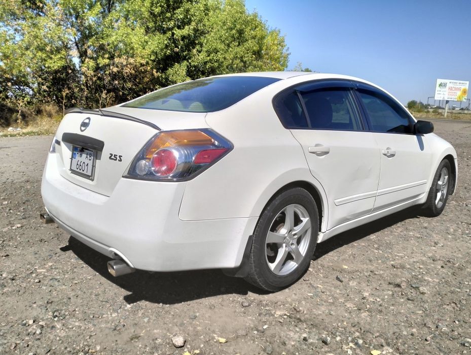 Ниссан Алтима  газ бензин