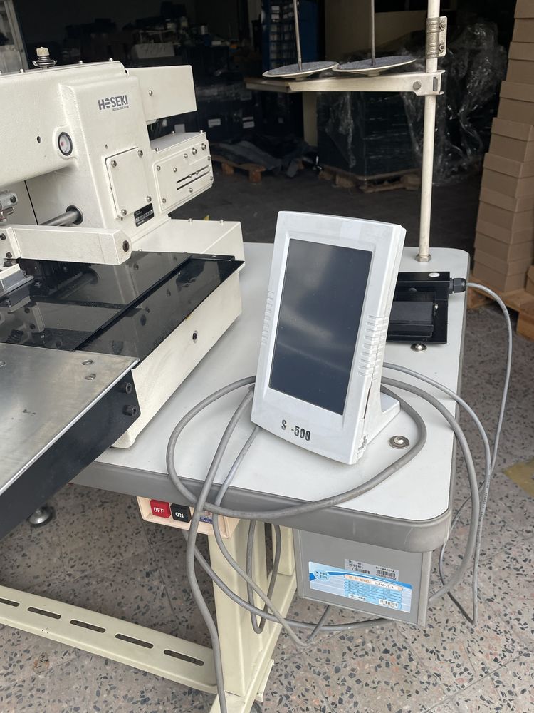Maquina de costura automatica
