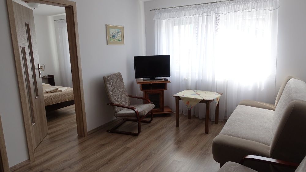 Rowy Apartamenty i pokoje gościnne Pod Dębem