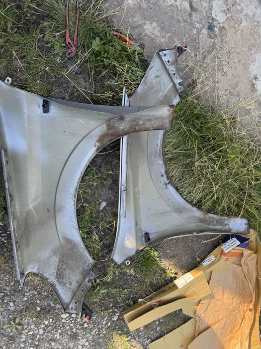 Blotnik opel astra H Z163 prawy
