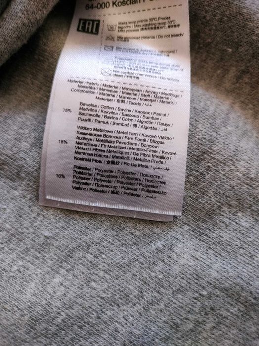 Ciepła brokatowa sukienka Coccodrillo 104 cm z pieskiem