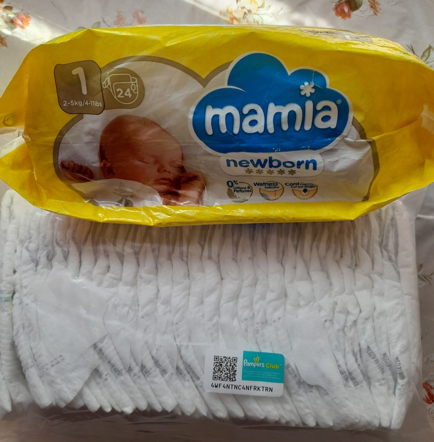 Продам залишки підгузків 1-го розміру(Pampers 27шт., mamia 24шт.)